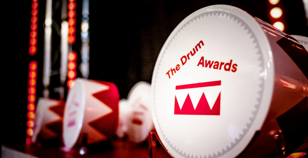 Drum Awards trophies lined up on table